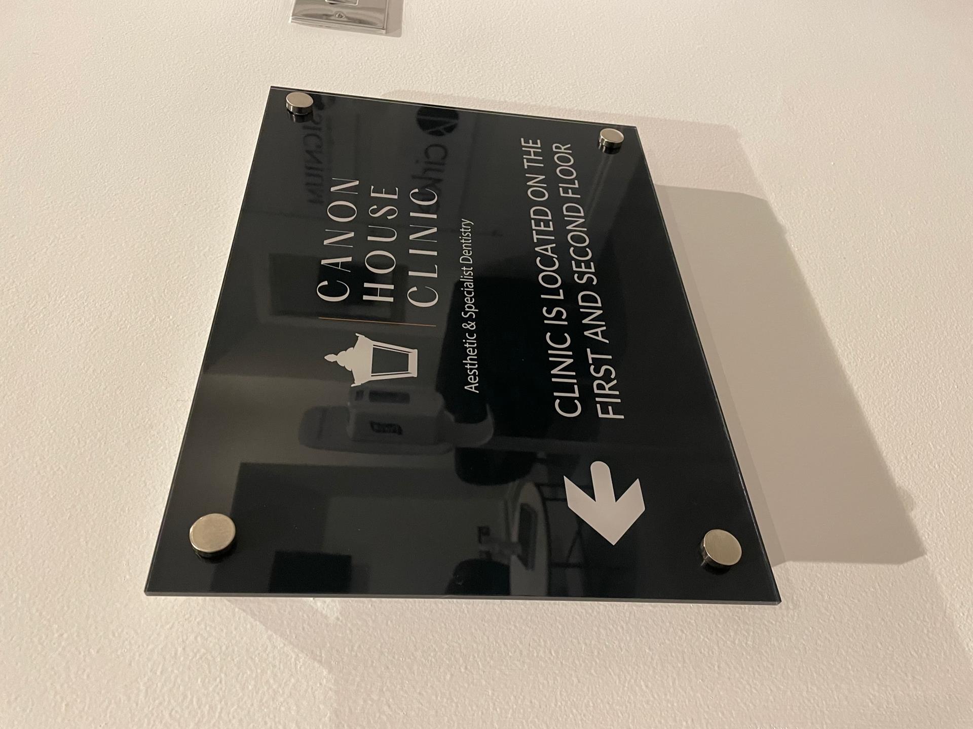 Canon House Clinic directional acrylic plaque