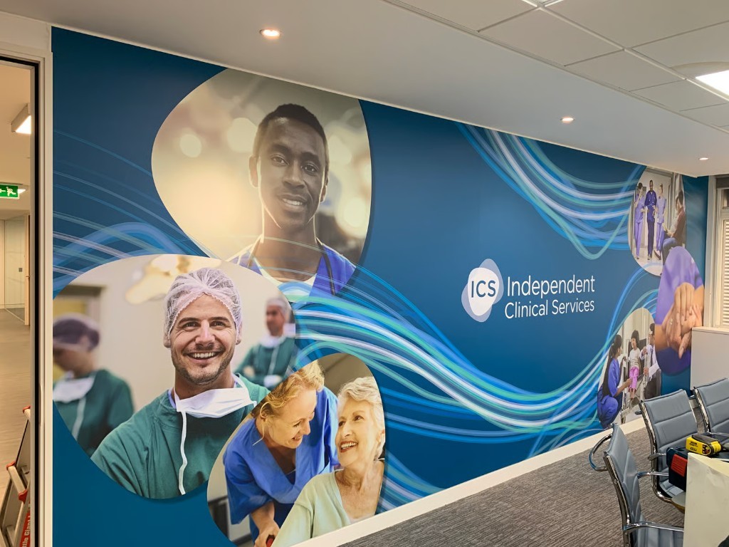 ICS Independent Clinical Services branded office wall mural
