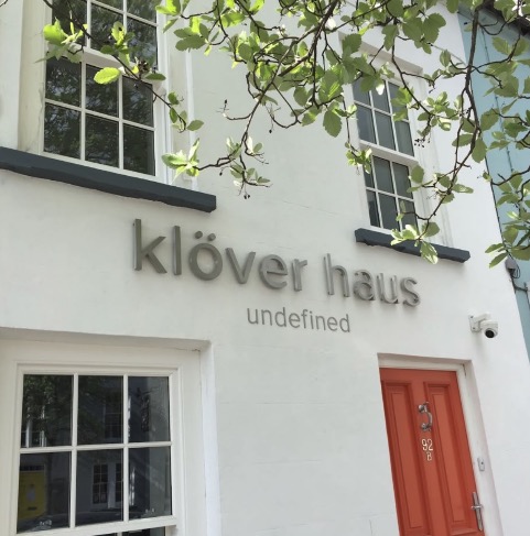 Klöver Haus exterior 3D lettering on a white facade
