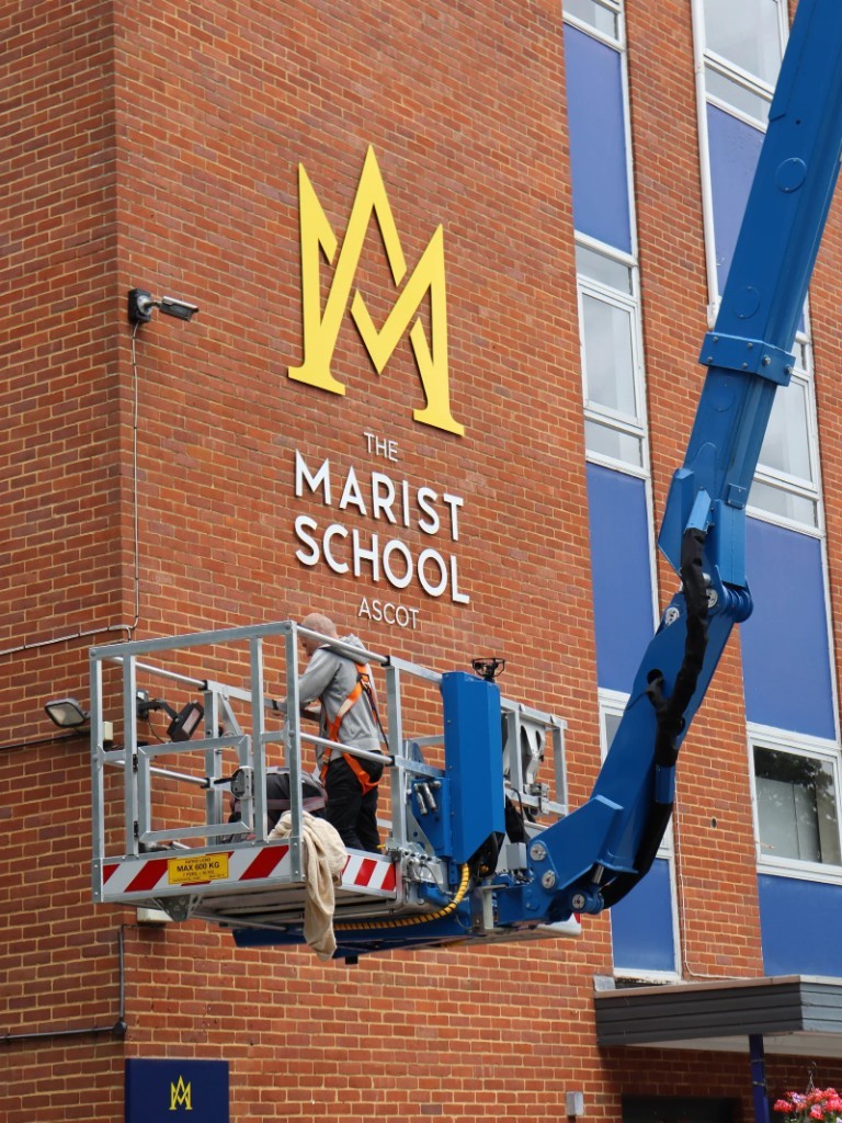 Cherry picker install of The Marist School Ascot exterior building sign