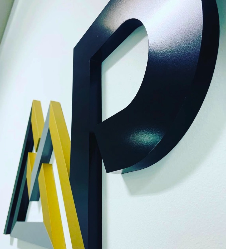 Built-up 3D office logo with geometric mark and letter P