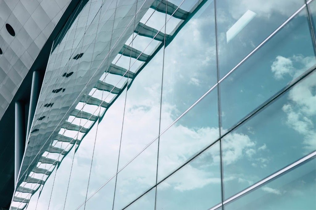 Contemporary office glass facade suited to solar and privacy film
