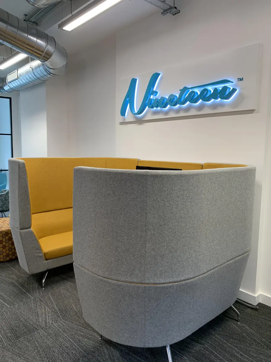 Illuminated sign used in a commercial interior