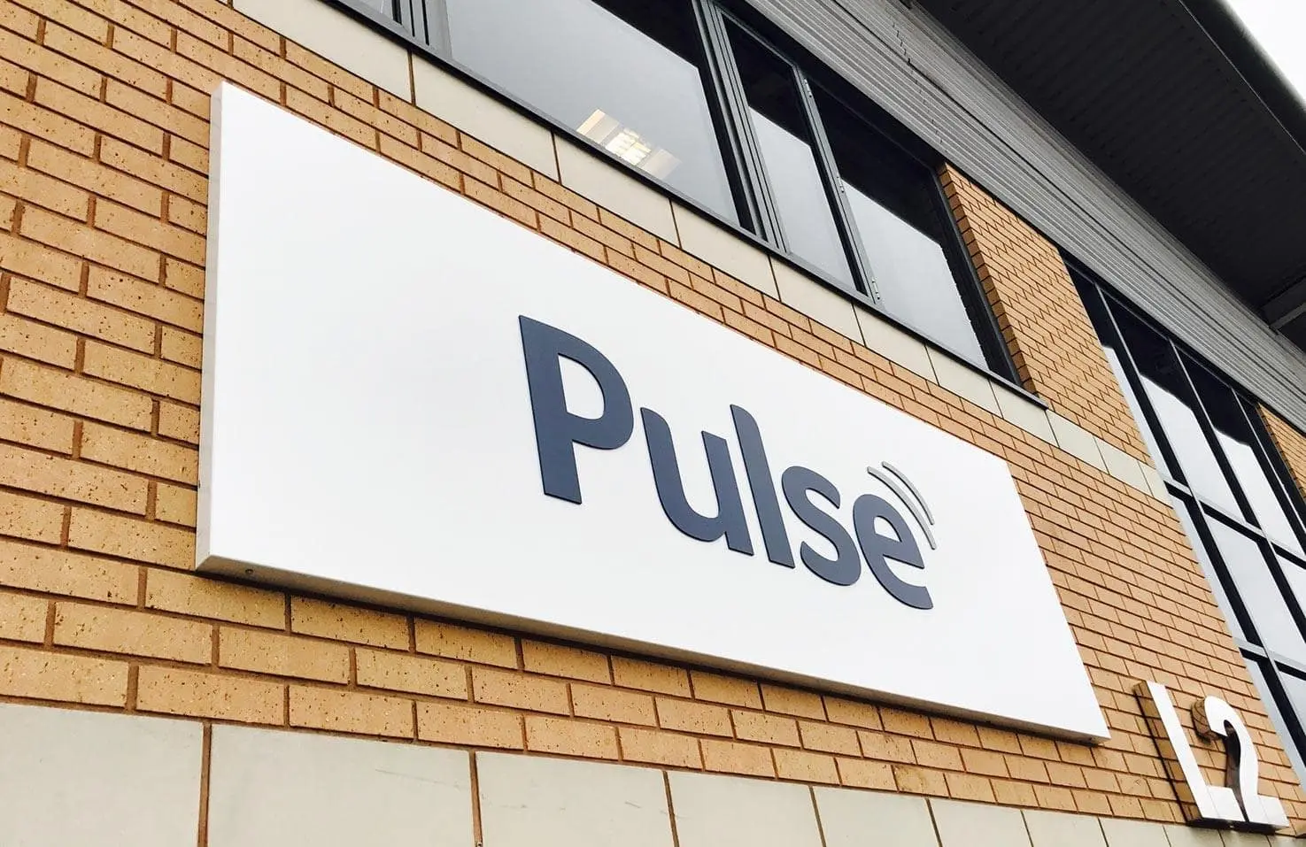 Bespoke business plaque installed by One Four Design