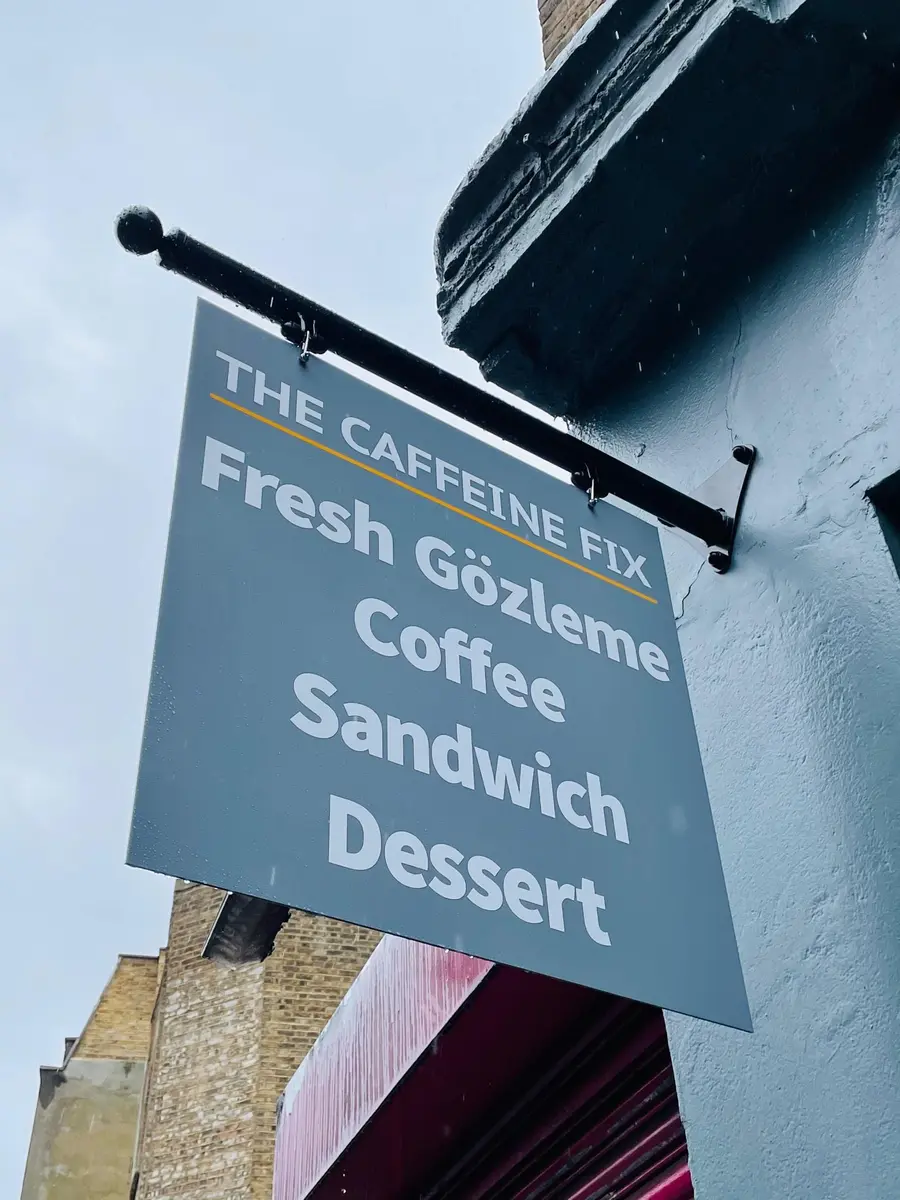 Traditional hanging projecting sign