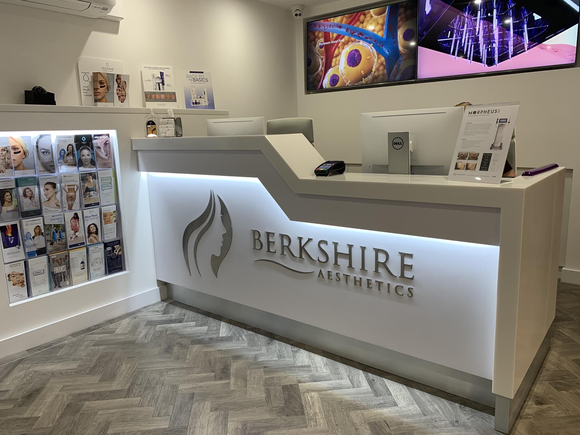 Bespoke reception desk signage by One Four Design