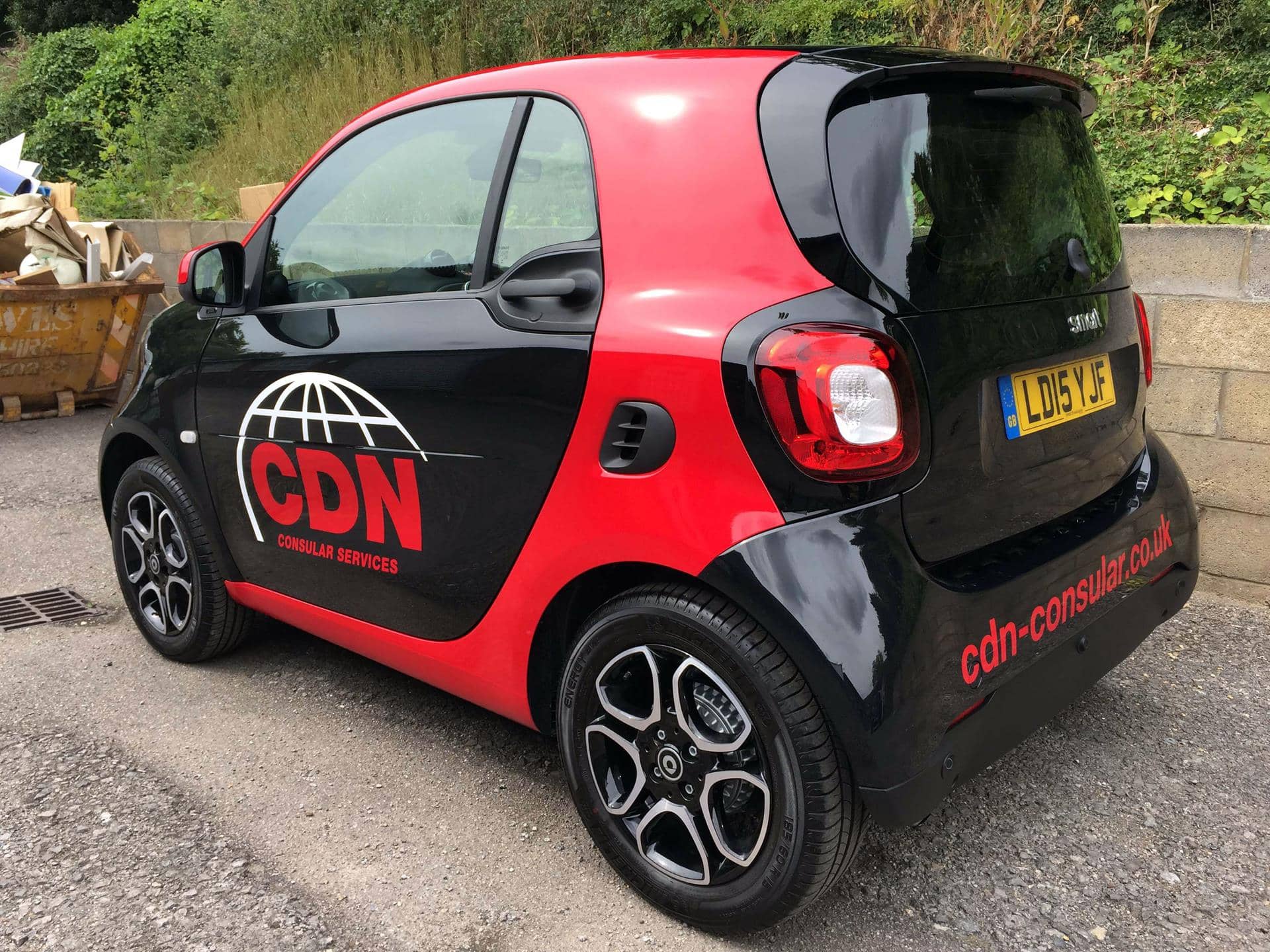 CDN Mini vehicle vinyl cut graphics on a Smart car