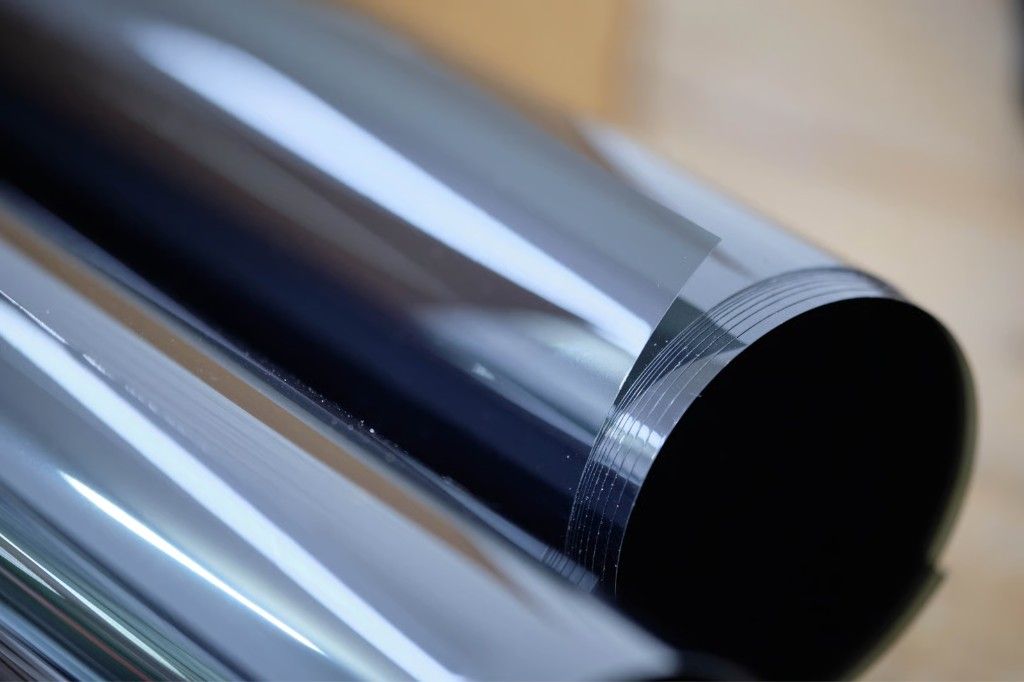 Roll of solar and privacy window film ready for installation