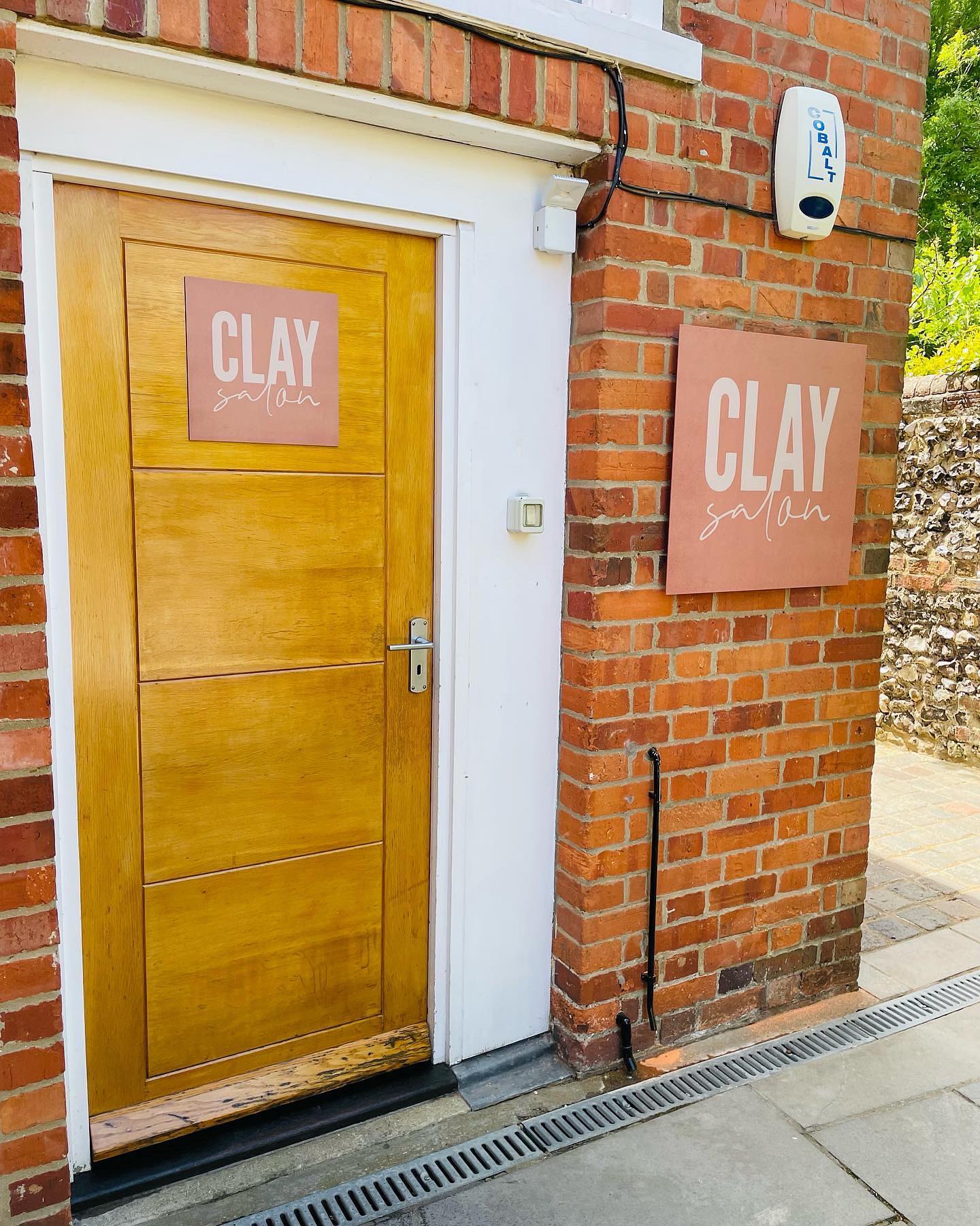 Exterior signage in Henley-on-Thames.