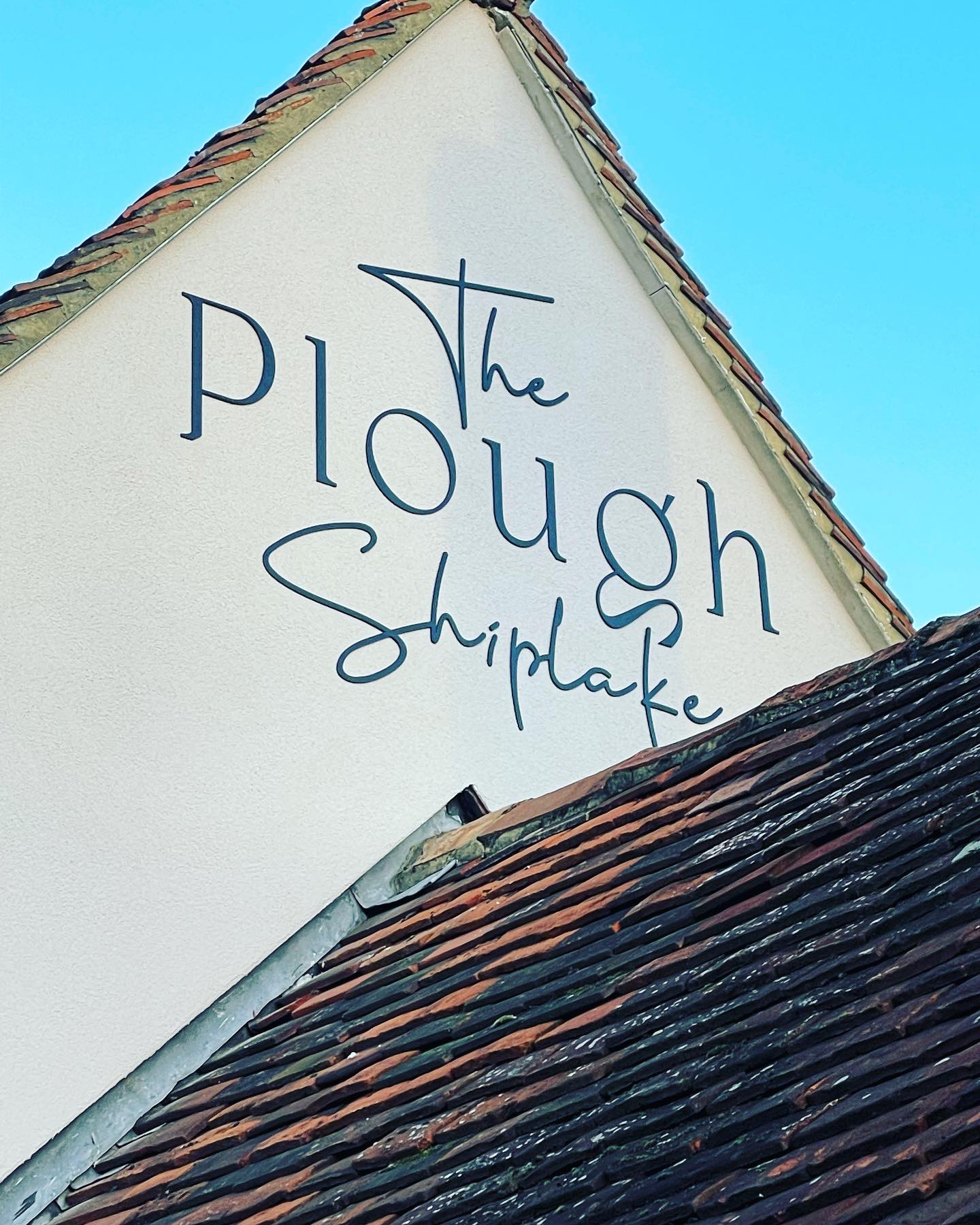 Exterior signage in Henley-on-Thames.