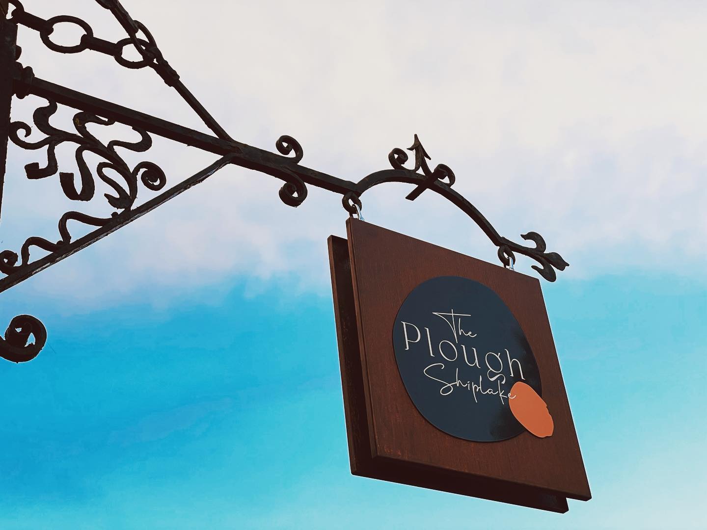 Exterior signage in Henley-on-Thames.