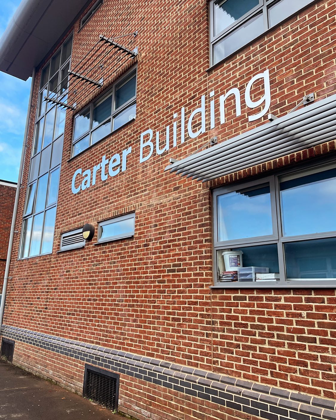Exterior signage in Wokingham.