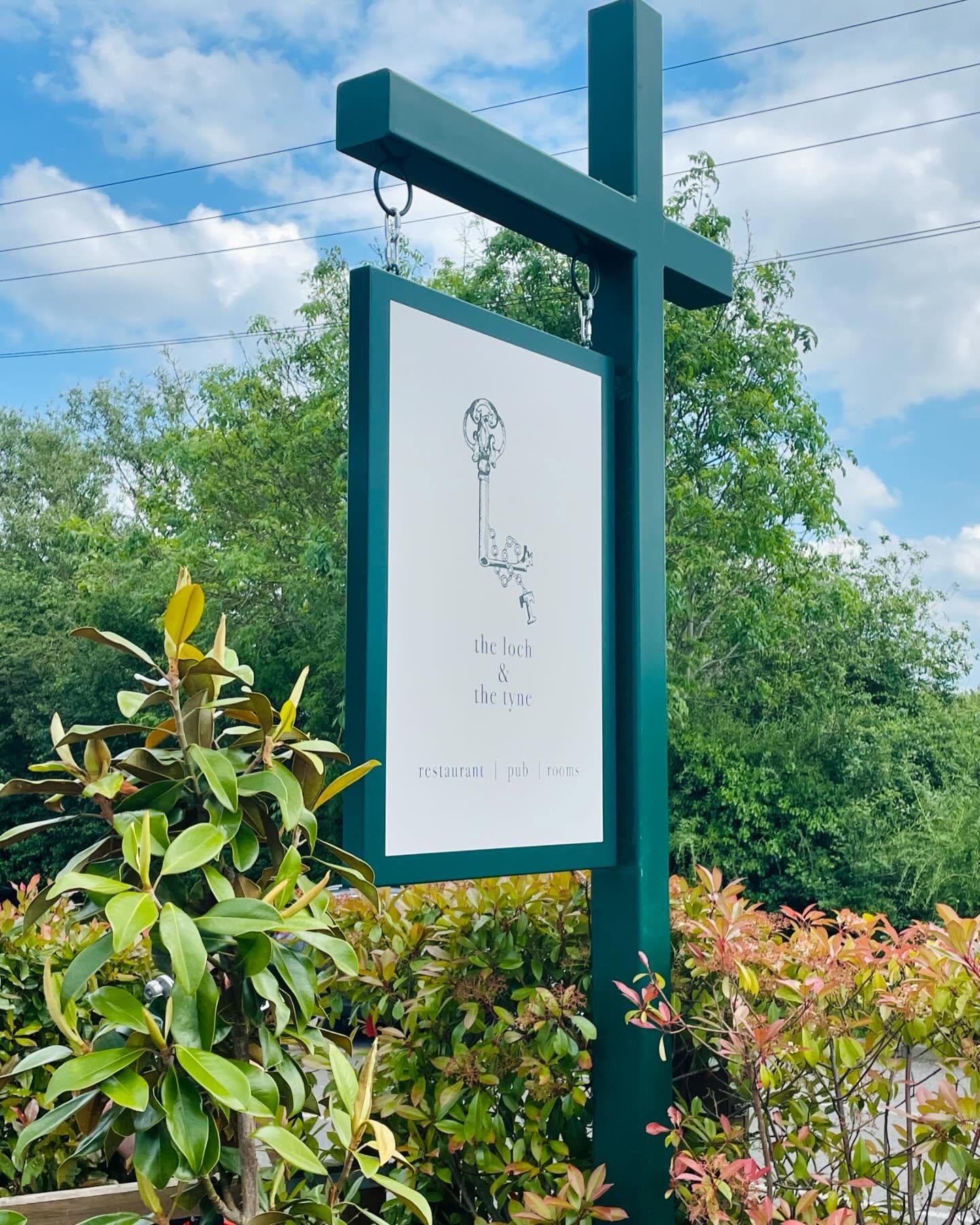 Hanging sign for Adam Handlings Gastro Pub in Old Windsor.